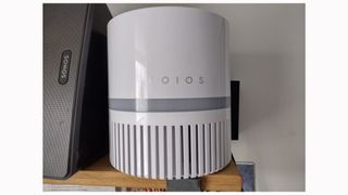 Image shows the KOIOS EPI810 air purifier on a shelf.
