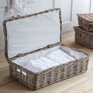 white towels folded in basket