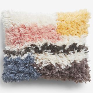 fluffy wool coloured cushion