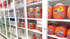 Laundry pods are locked behind glass to prevent shoplifting at a Target in New York City.