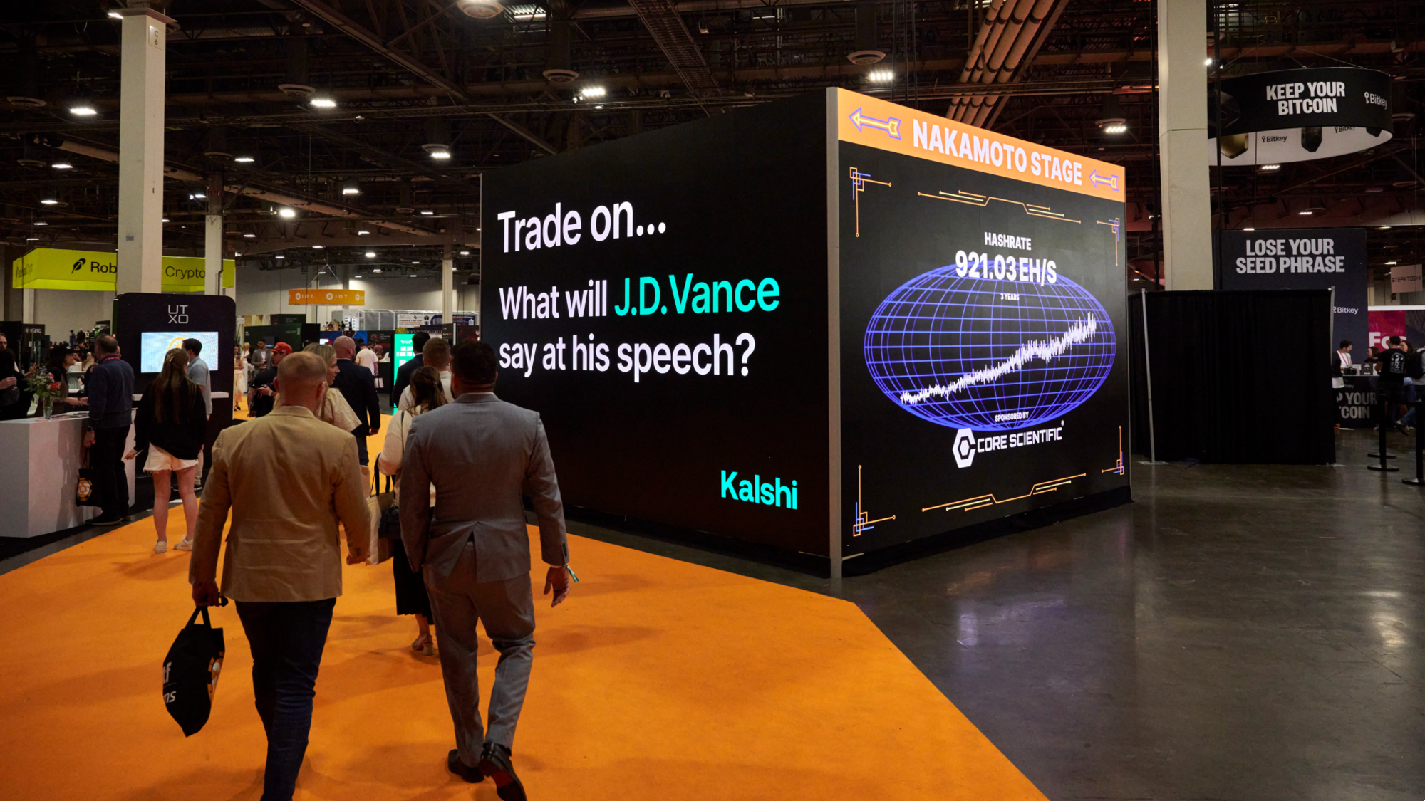 A Kalshi sign reading "Trade on what will JD Vance say at his speech?" the Bitcoin 2025 conference in Las Vegas, Nevada, US, on Tuesday, May 27, 2025. The event will examine Bitcoin's evolving global impact with speakers from education, policy, finance, and technology. Photographer: Bridget Bennett/Bloomberg via Getty Images