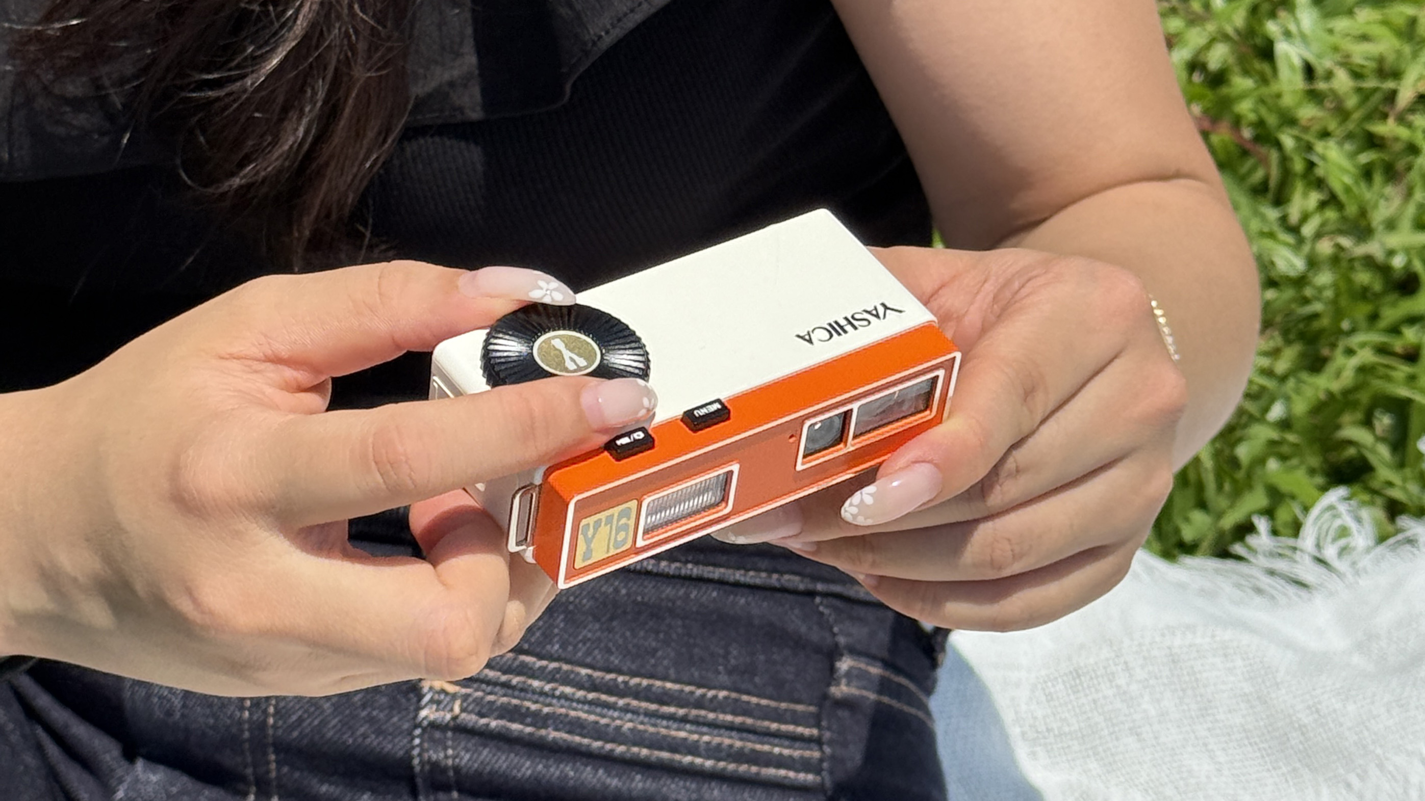 The Yashica Y16 Pocket Camera in a person's hands