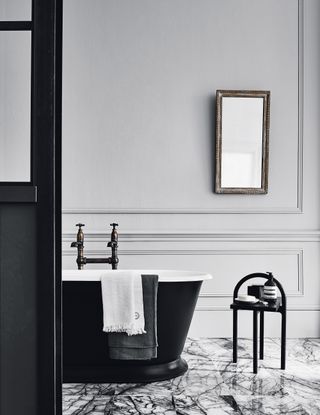 Luxury bathroom scheme with Mandarin Stone 's Calacatta Viola polished marble tiles