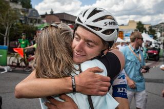 Adrian Costa (Axeon) gets a hug from family after today's spectacular ride