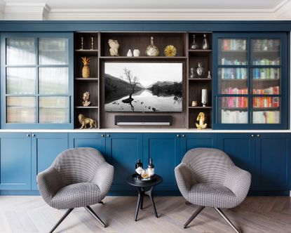 Soundbar or surround sound TV and soundbar mounted into a feature wall of joinery