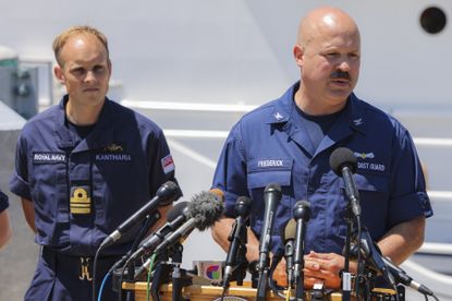 A photo of Coast Guard Capt. Jamie Frederick talking to the press about the search for the Titan submersible