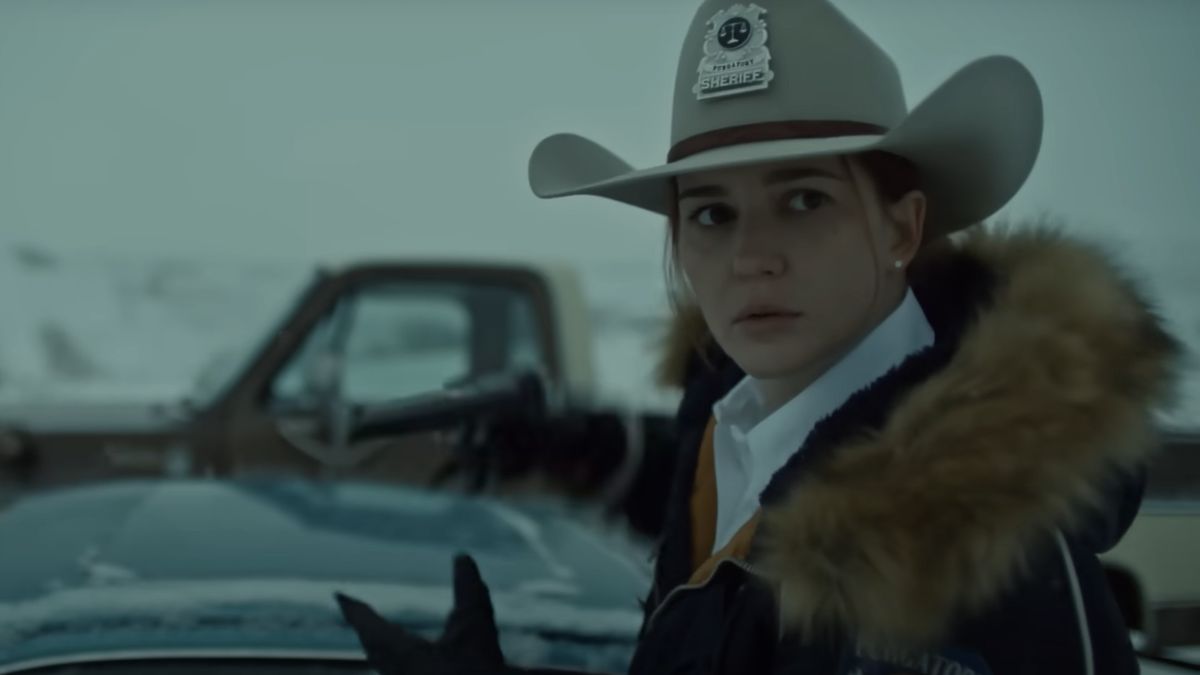 Melanie Scrofano in a sheriff&#039;s hat as Wynonna Earp