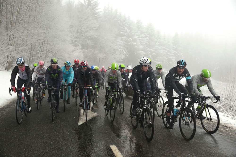 Pack rides under the snow during the third stage of the 74th edition of the Paris-Nice