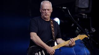 David Gilmour performing live onstage open air in Koenigsplatz, Munich, playing Fender Stratocaster guitar, 29 July, 2006