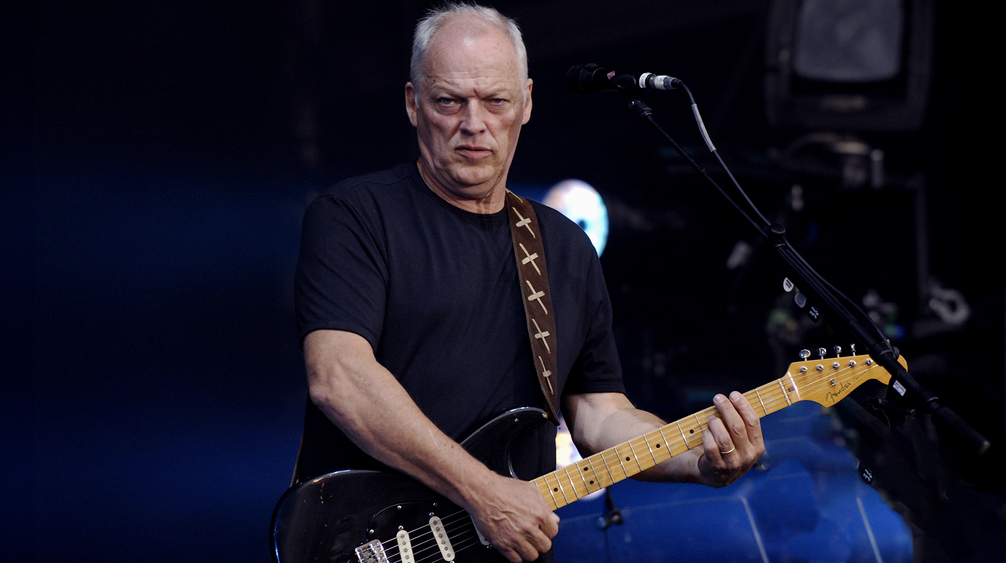 David Gilmour performing live onstage open air in Koenigsplatz, Munich, playing Fender Stratocaster guitar, 29 July, 2006
