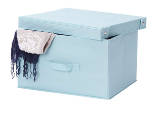 Pale blue lidded storage box with strong carry handles and clothing hanging out