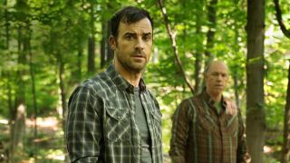 Justin Theroux as Kevin Garvey and Michael Gaston as Dean in a woodland setting in The Leftovers, season 1