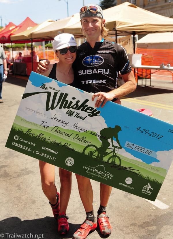 Jeremy Horgan-Kobelski and wife Heather Irmiger at the check presentation