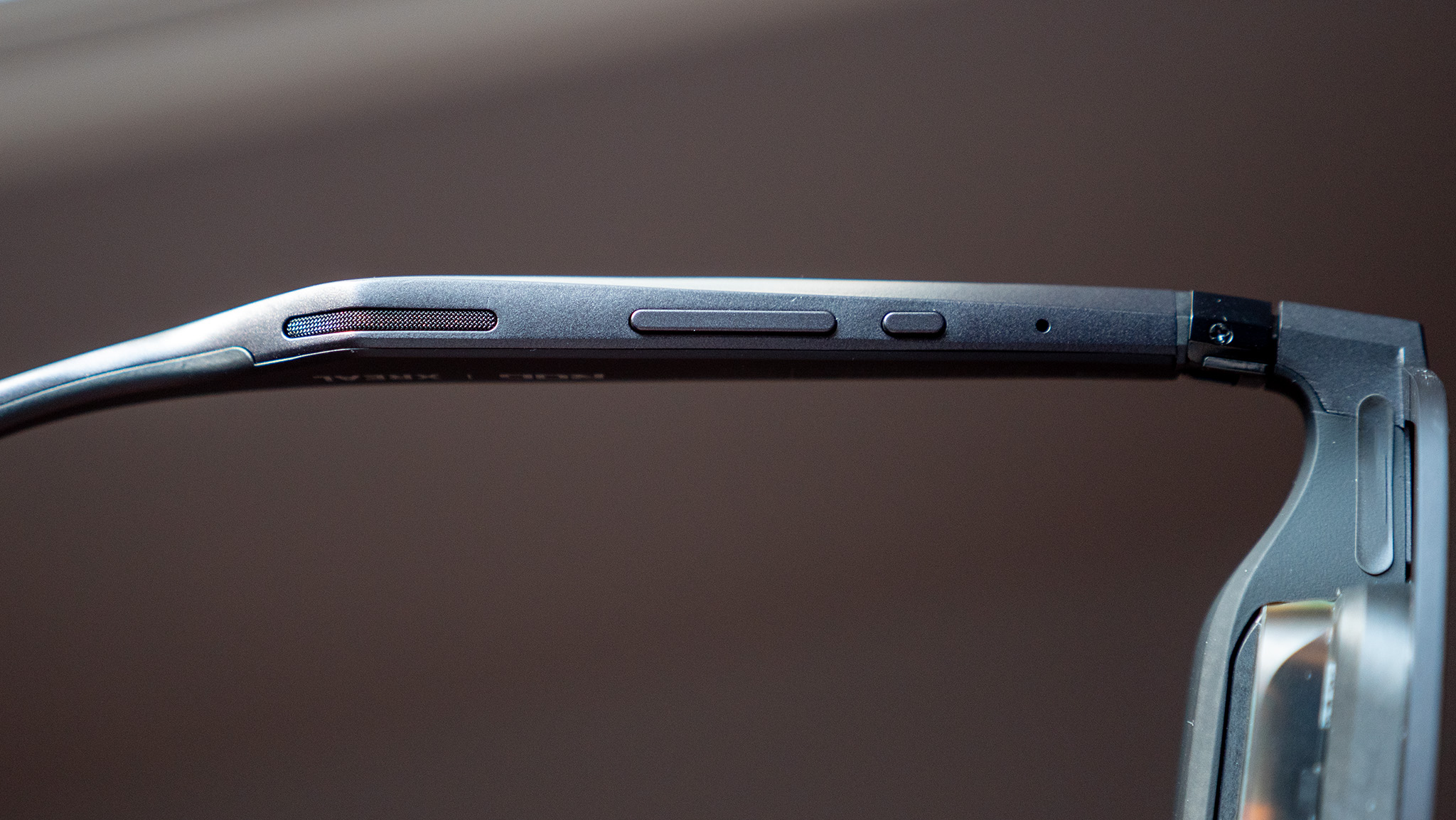 Buttons on the underside of the Xreal ROG R1 smart glasses' right arm