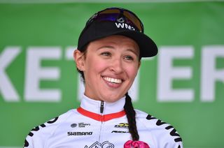Kasia Niewiadoma (WM3 Pro Cycling) smiles from the podium