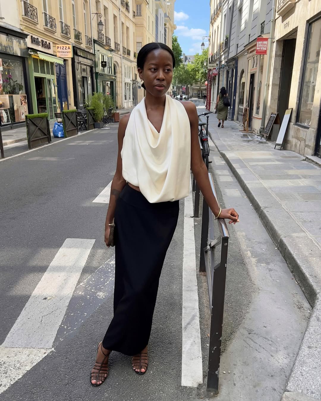 @sylviemus_ wears a black column skirt