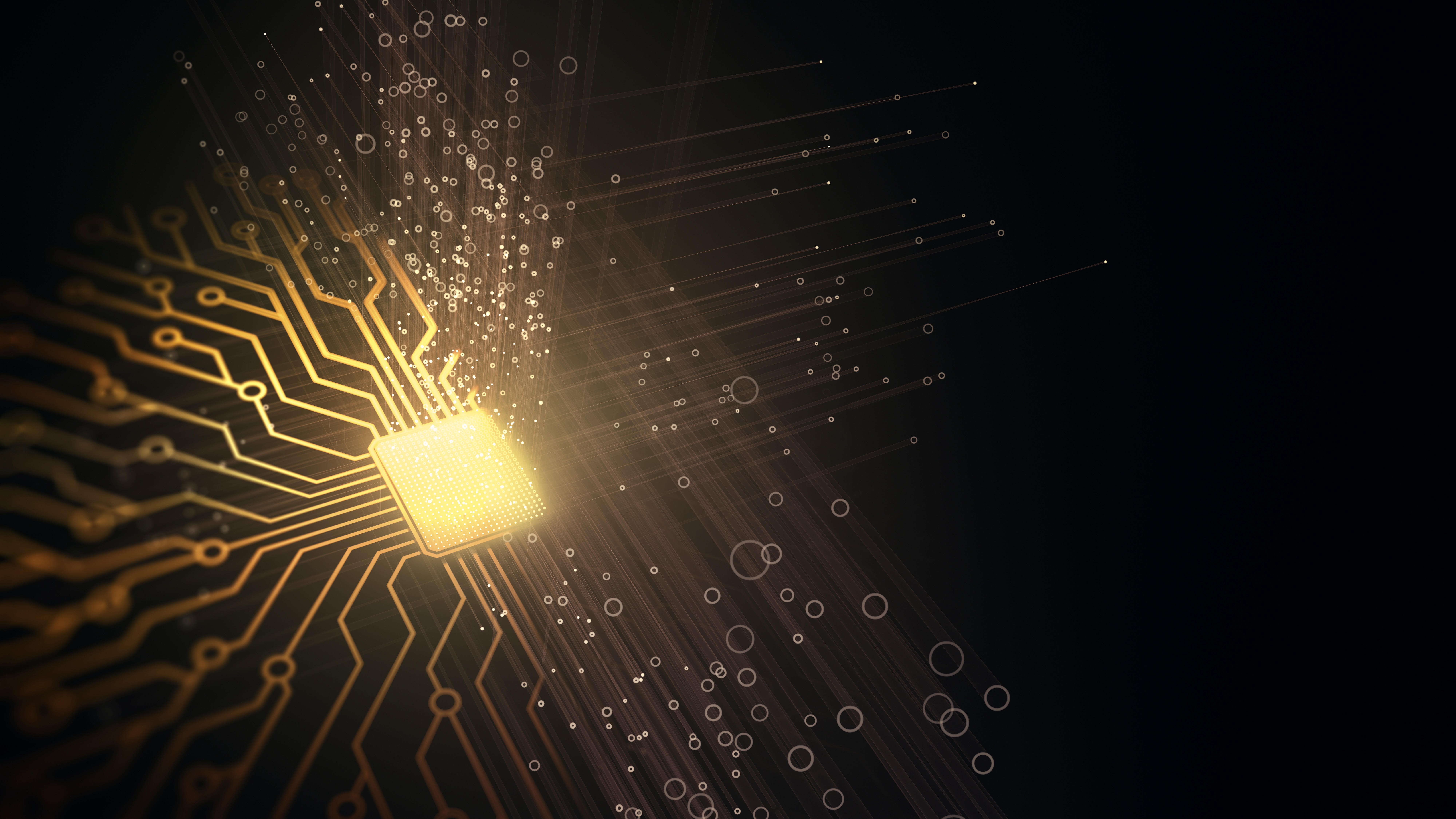 A render of a golden chip that is emitting some energy