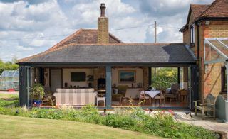 bank of bifold door on single storey extension