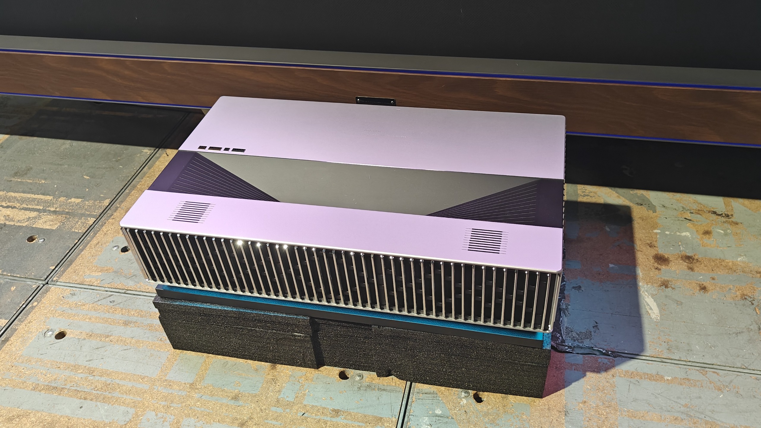 AWOL LuxVision projector sat on blocks on the floor
