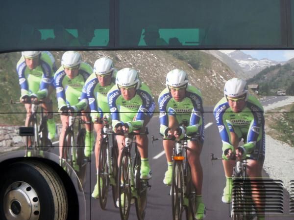 Liquigas' riders stay warm in their bus, perhaps thinking whether their performance can form the mural for next season's bus.