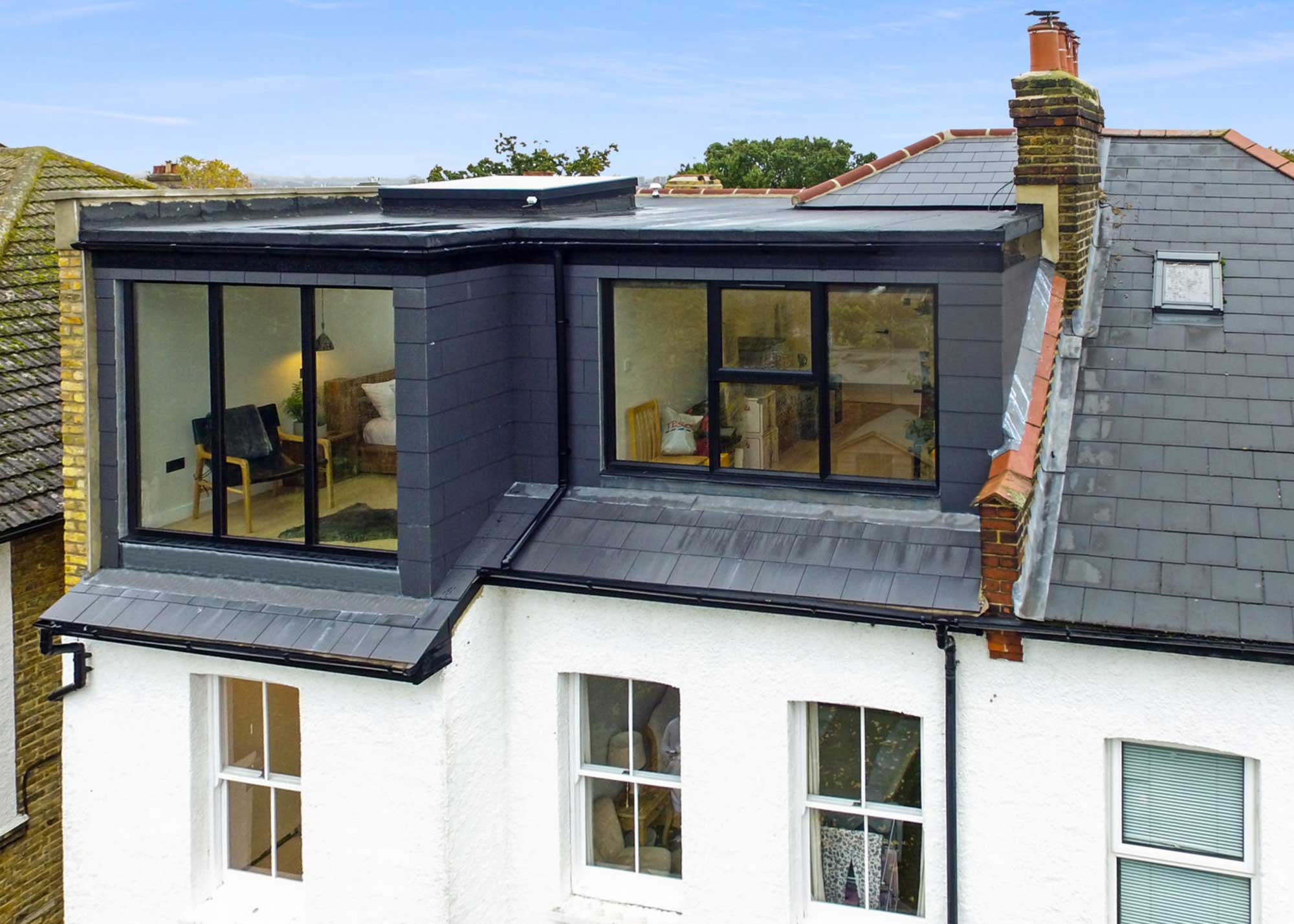 slate clad hip-to-gable loft conversion with dormers