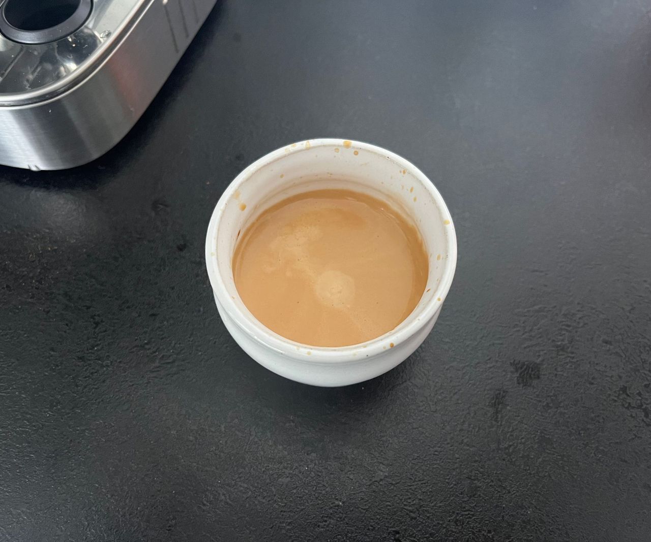 An espresso with crema viewed from above