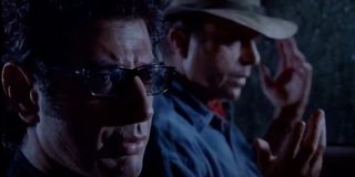 Jurassic Park Jeff Goldblum and Sam Neill riding in a stormy Jeep