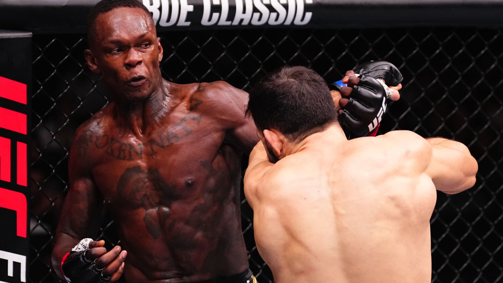 Israel Adesanya of Nigeria punches Nassourdine Imavov of Russia in a middleweight fight during the UFC Fight Night event at anb Arena in February 2025 