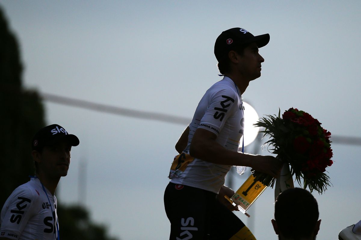 Mikel Landa steps onto the podium as Sky collect the team classification prize in Paris