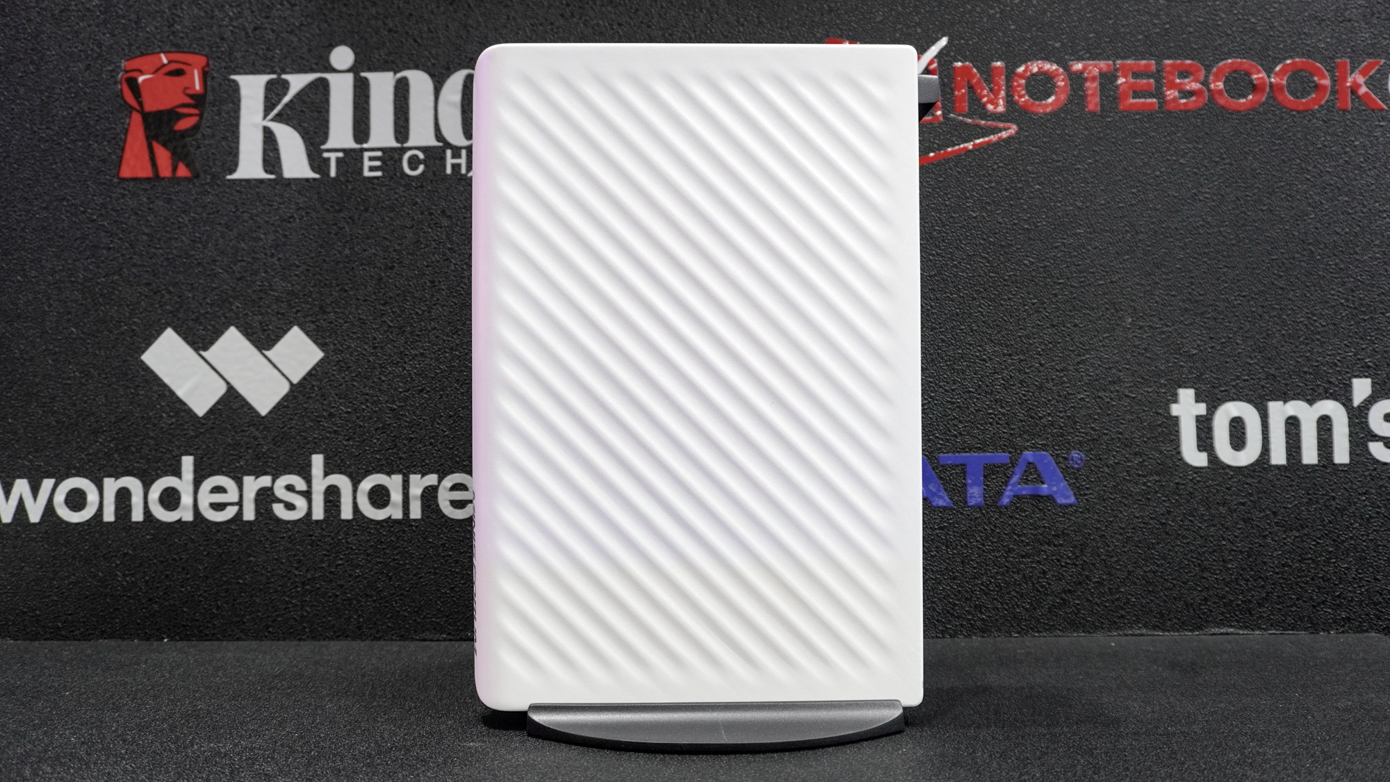 A side view of the Minisforum G1 Pro on a table