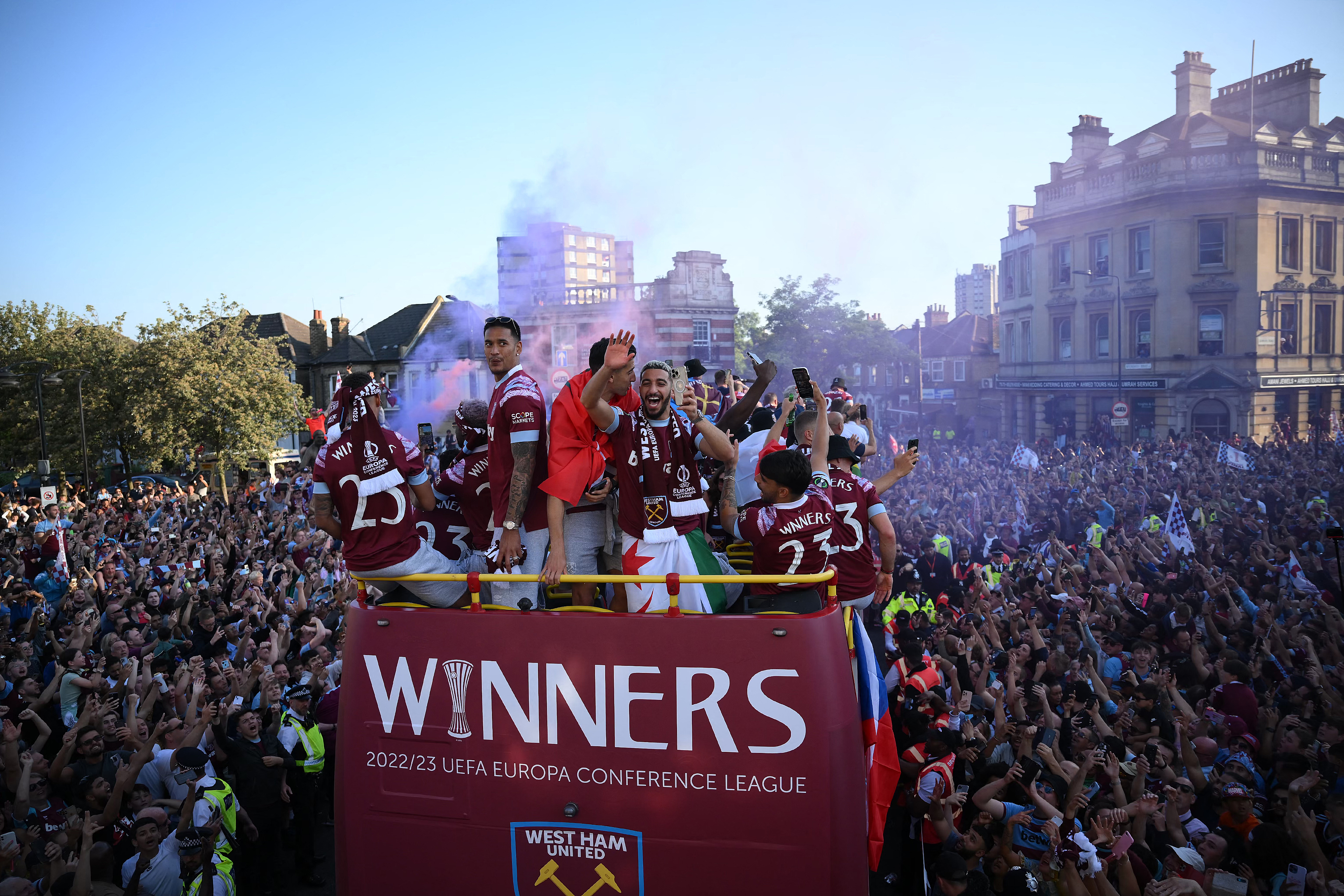 West Ham celebrate with their fans on a bus parade following their Europa Conference League win in June 2023.