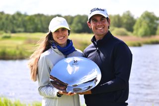 Matteo Manassero poses with the trophy with his wife