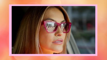 Does Chrishell Stause leave the Oppenheim Group? Pictured: Close-up of Chrishell Stause in pink sunglasses in Selling Sunset season 6