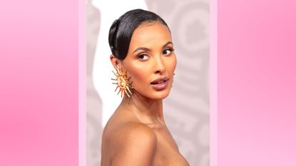  Maya Jama wears gold sun earrings as she attends The BRIT Awards 2023 at The O2 Arena on February 11, 2023 in London, England/ in a pink gradient template