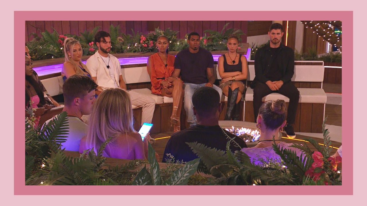 the cast of summer Love Island 2023 sat around the fire pit