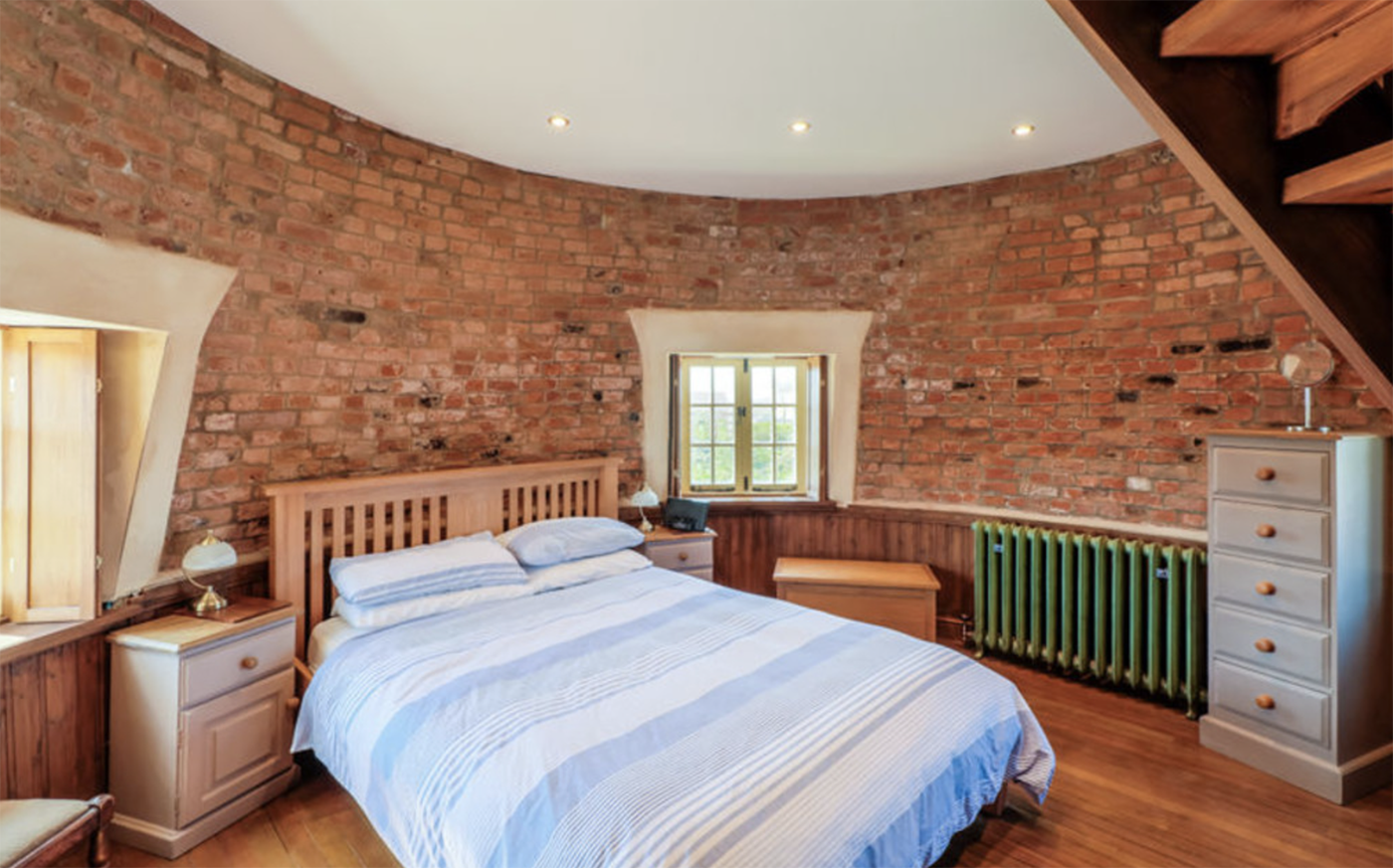 Circular bedroom in converted mill