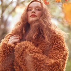 model wearing a teddy coat during winter