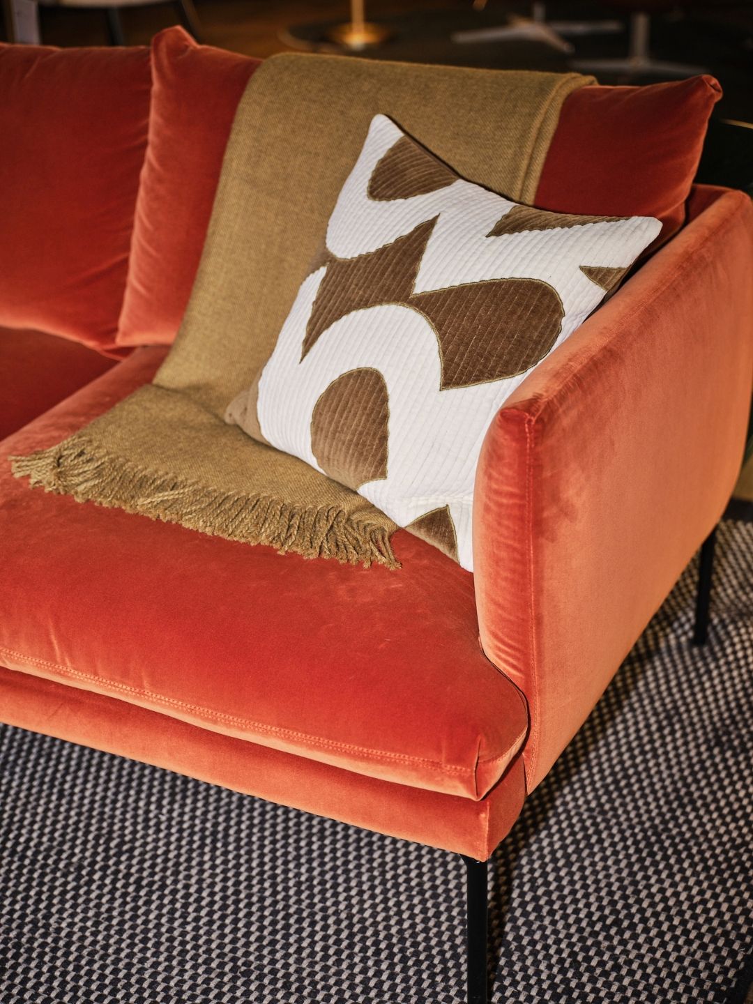 Side view of the Heal&rsquo;s Matera sofa, highlighting its thin arm, slim elevated legs and compact shape, which give it a lighter presence in a room.