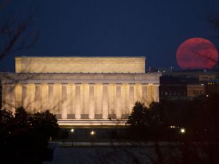 The full moon is seen as it rises near the Lincoln Memorial, Saturday, March 19, 2011, in Washington. The full moon tonight is called a super perigee moon since it is at its closest to Earth in 2011. The last full moon so big and close to Earth occurred in March 1993.