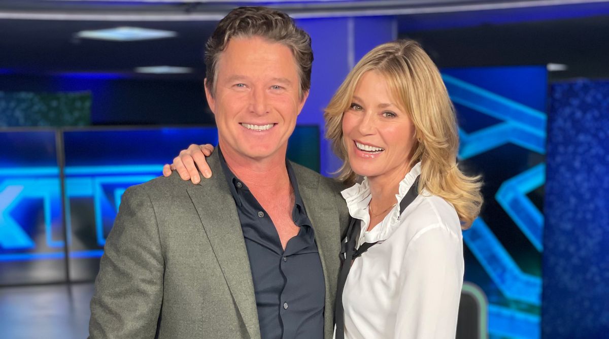 &#039;Extra&#039; has been hosted by Billy Bush, seen here with actress Julie Bowen, since September 2019.