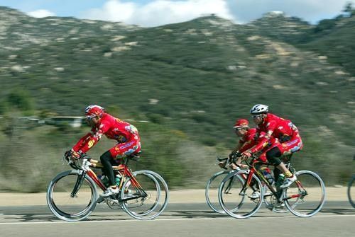 The team blows by on a descent.