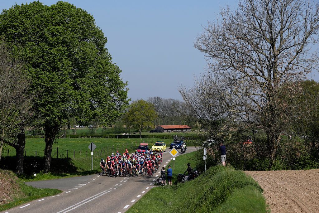 A long view of the tightly-packed peloton