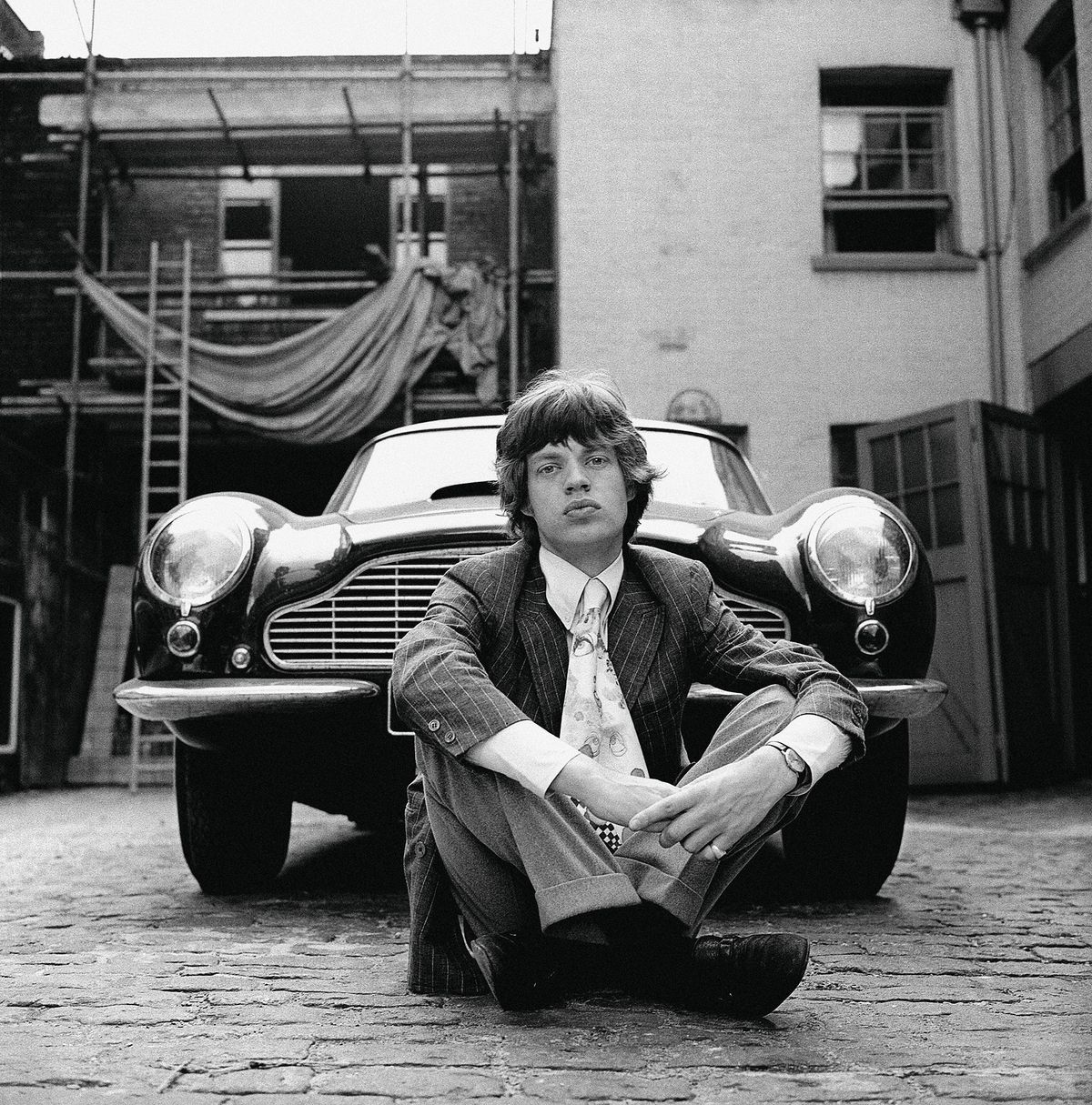 Mick Jagger and his Aston Martin, Bryanston Mews East, 1966