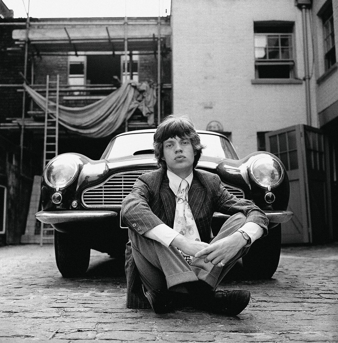 Mick Jagger and his Aston Martin, Bryanston Mews East, 1966