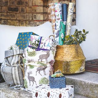 gift wrap with christmas sack and stack of presents