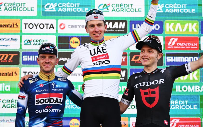 BERGAMO, ITALY - OCTOBER 11: (L-R) Remco Evenepoel of Belgium and Team Soudal Quick-Step on second place, race winner Tadej Pogacar of Slovenia and Team UAE Team Emirates and Michael Storer of Australia and Team Tudor Pro Cycling on third place pose on the podium ceremony after the 119th Il Lombardia 2025 a 241km one day race from Como to Bergamo on October 11, 2025 in Bergamo, Italy. (Photo by Dario Belingheri/Getty Images)