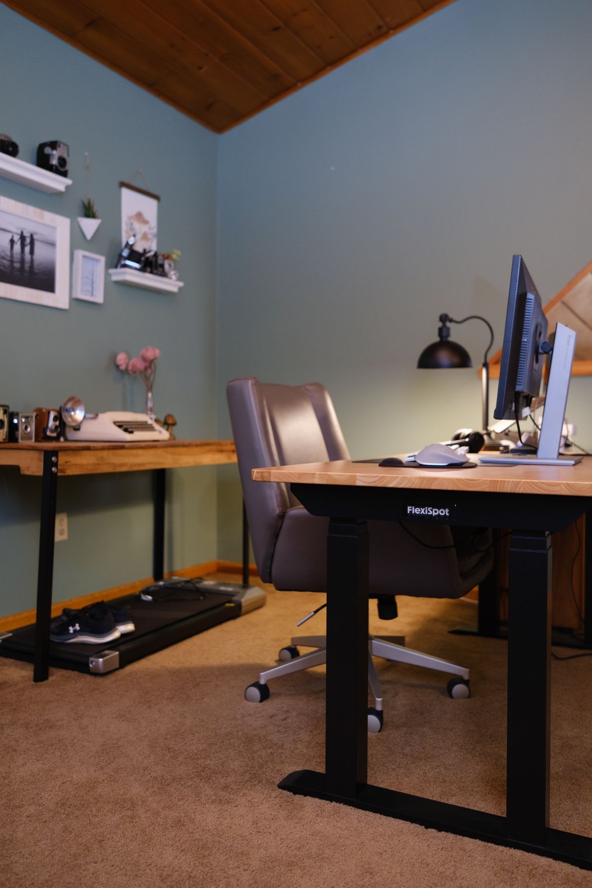 A Flexispot E7 Pro Max standing desk in an office