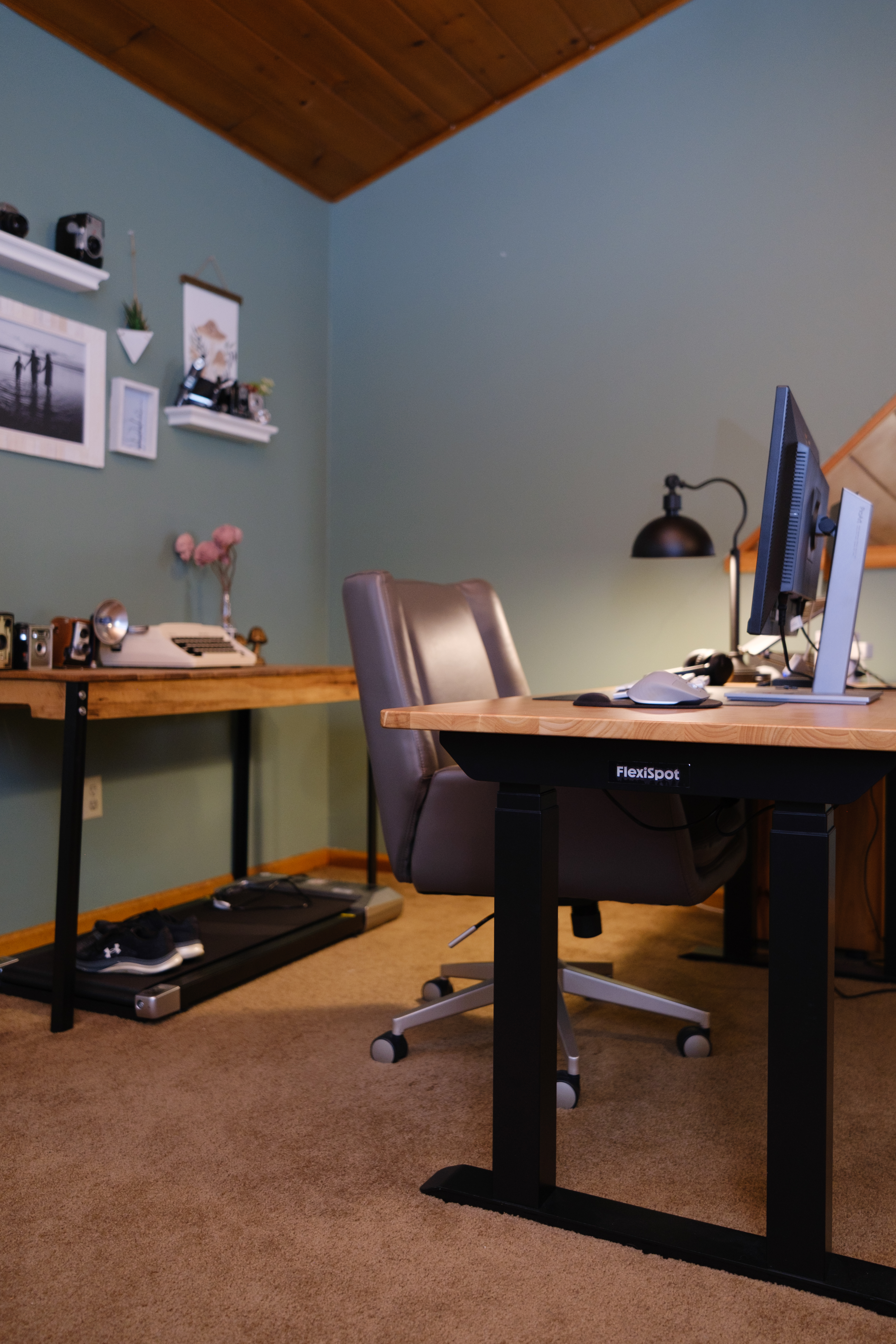 A Flexispot E7 Pro Max standing desk in an office