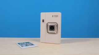 A Sand Beige Fujifilm Instax mini LiPlay Plus hybrid instant camera