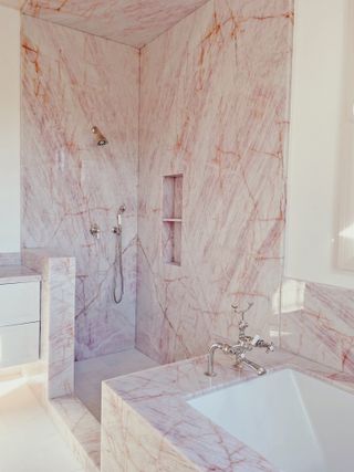 A bathroom made of pink marble